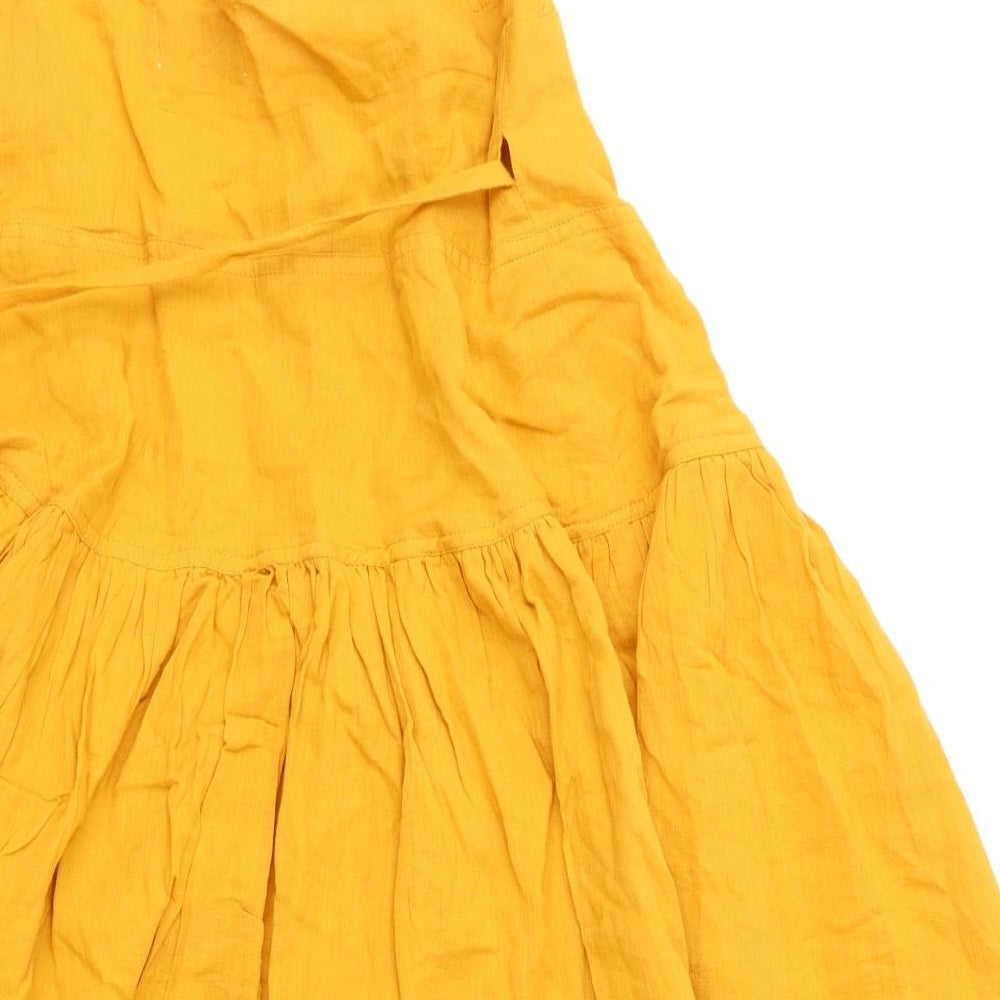 Brand and care label for ASOS women’s yellow 100% cotton wrap dress, size UK 10, v-neck tie