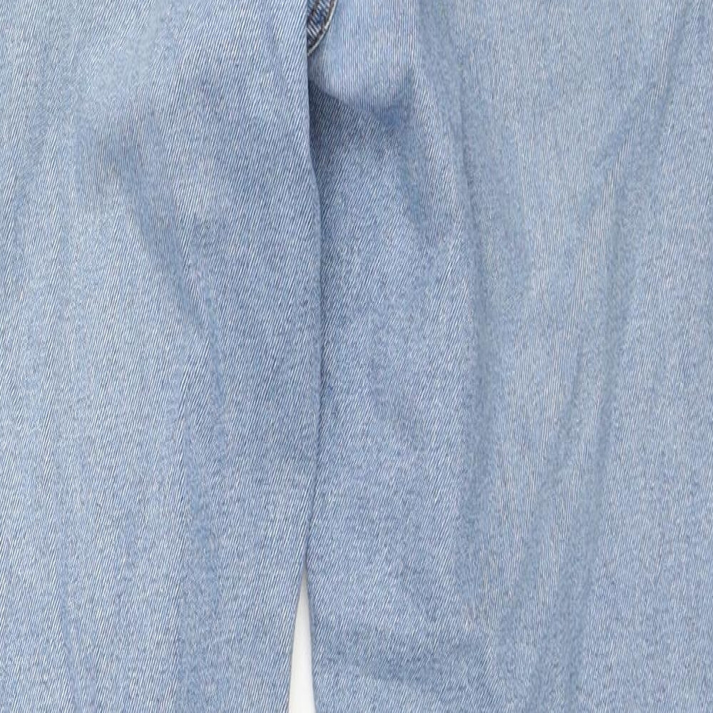 Brand and care label for ASOS women’s blue cotton skinny jeans, size UK 32, in, 30-inch leg regular zip