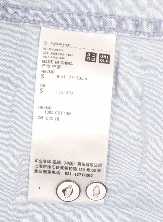Brand and care label for unisex denim blue button-up long sleeve shirt by uniqlo