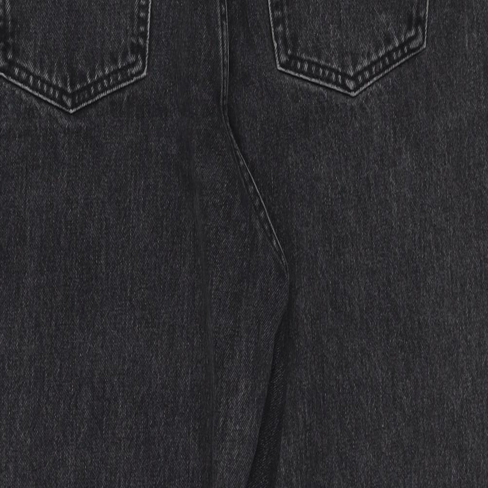 Brand and care label for ASOS women’s black cotton wide-leg jeans, size UK 30, in, 32-inch leg regular zip