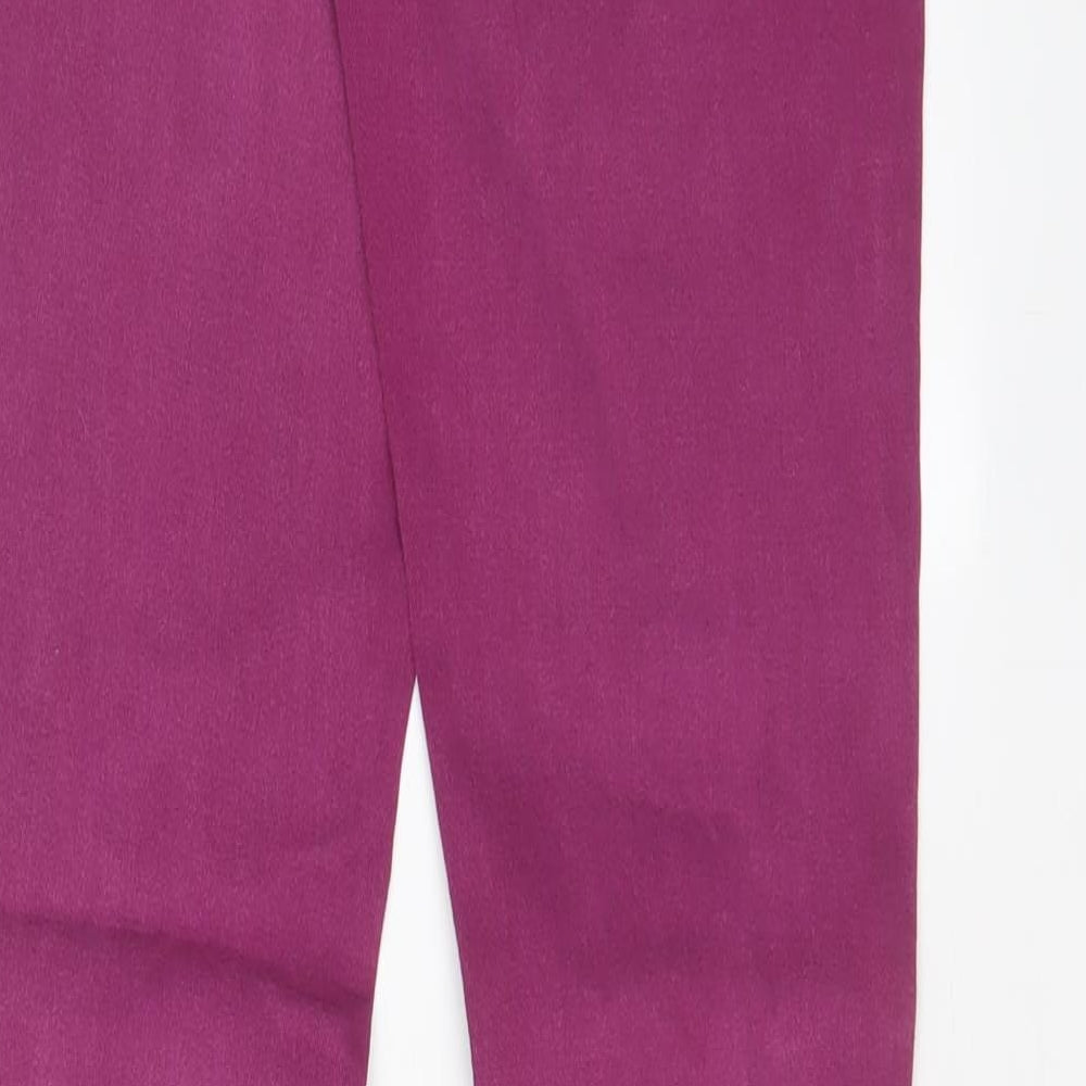 Brand and care label for Miss Selfridge women’s purple cotton skinny jeans, size UK 10, 28-inch leg regular zip