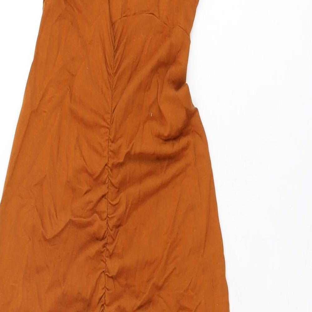 Brand and care label for ASOS women’s orange viscose bodycon, size UK 6, square neck pullover
