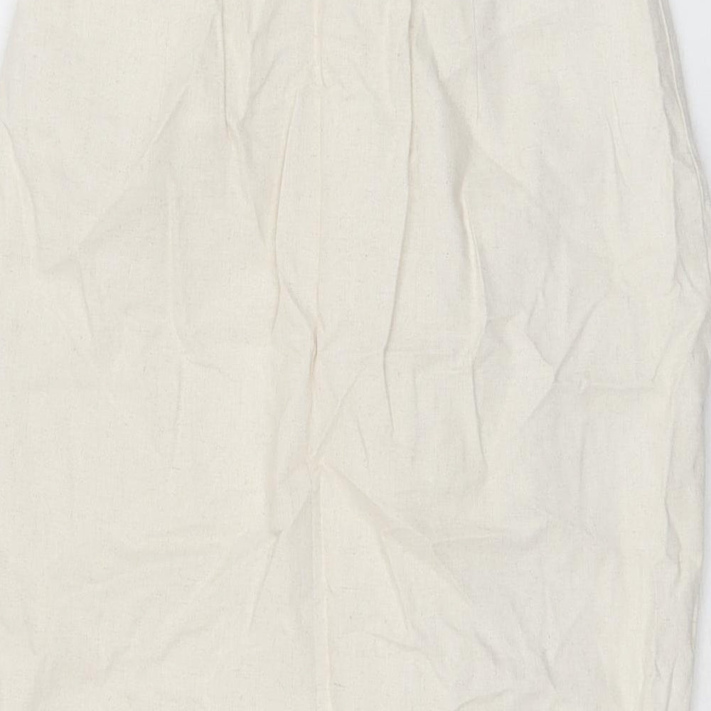 Brand and care label for In the Style women’s beige polyester straight & pencil skirt, size UK 10, zip