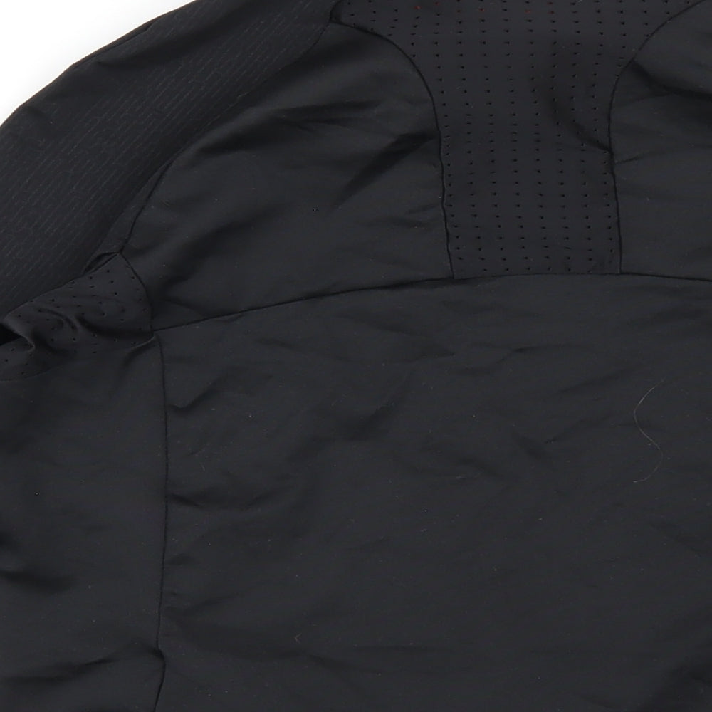Brand and care label for Decathlon boys’ black jacket, size 12-13, years zip
