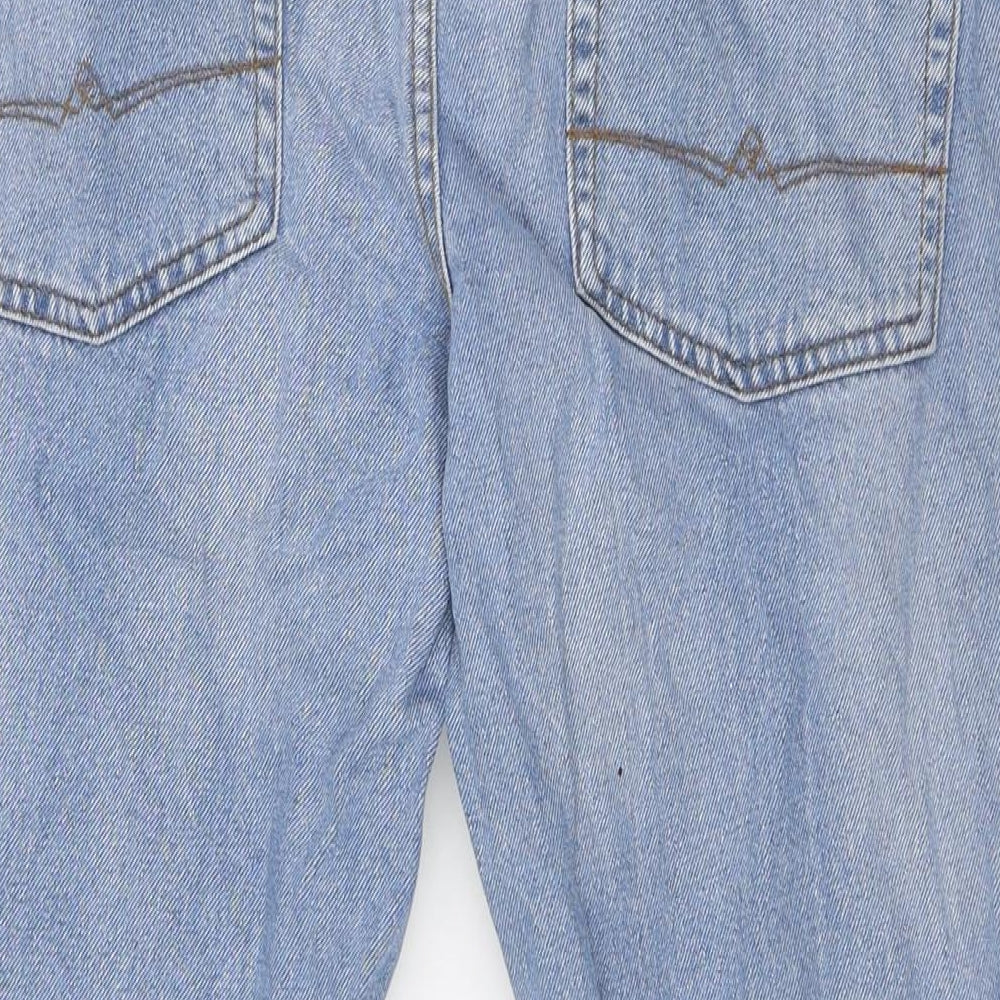 Brand and care label for ASOS men’s blue cotton tapered jeans, size 34, in, 32-inch leg regular button