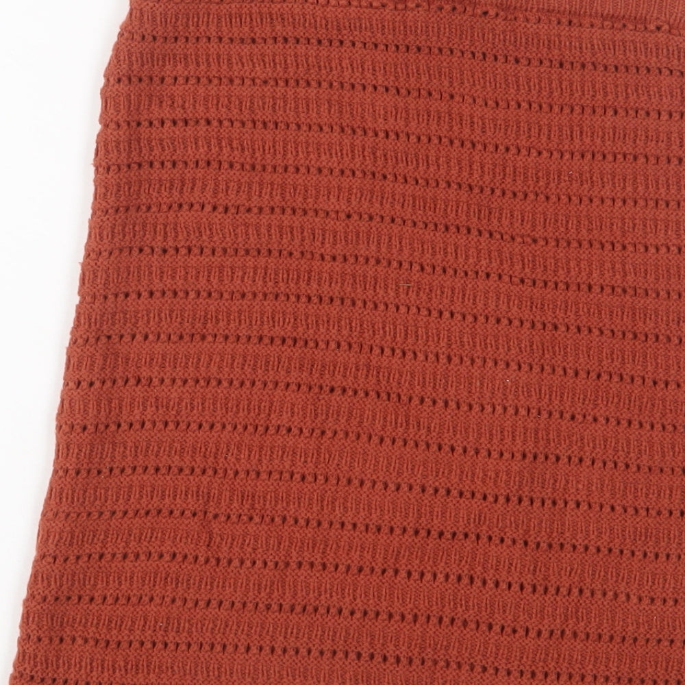 Brand and care label for ASOS women’s brown acrylic a-line skirt, size UK 6