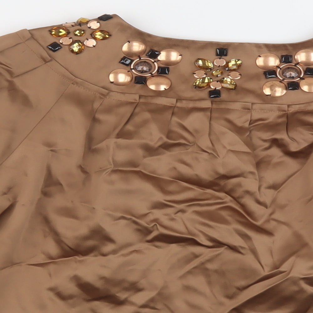 Brand and care label for Autograph women’s brown jacket, size UK 12, hook & eye