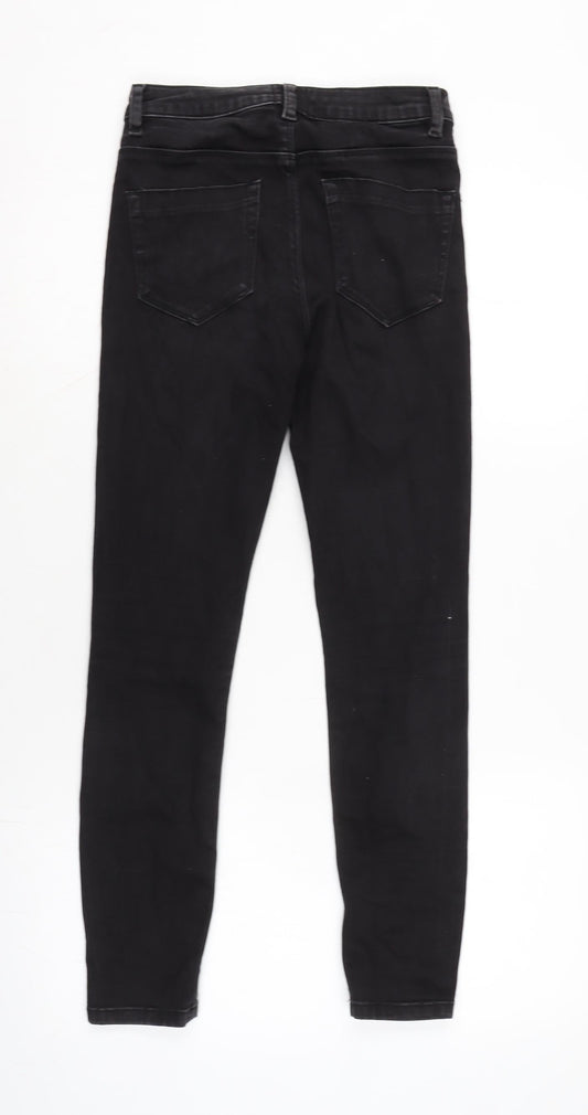 Back view of ASOS women’s black cotton blend tapered jeans, size UK 25, in, 26-inch leg regular zip
