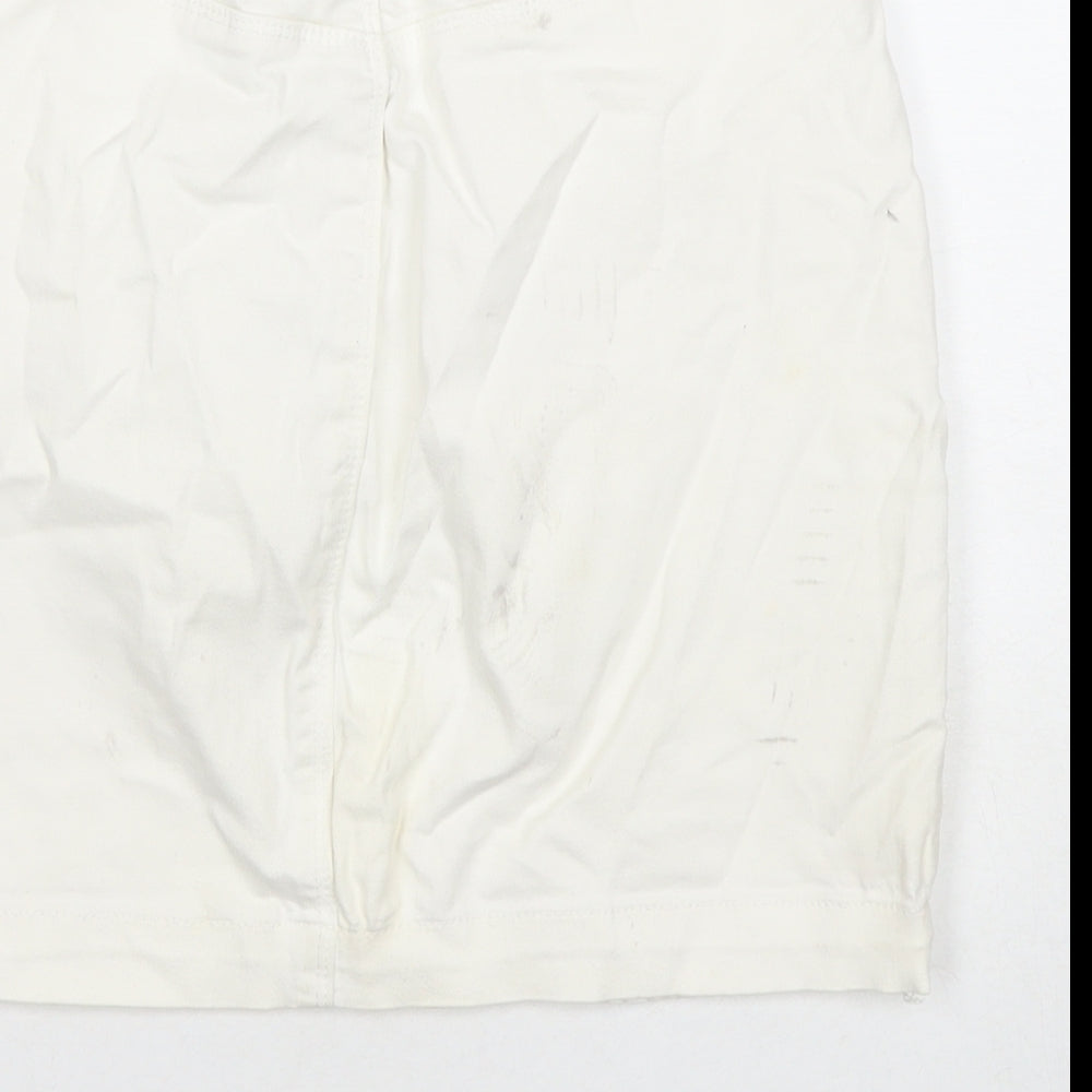 Brand and care label for Missguided women’s white cotton a-line skirt, size UK 10, zip