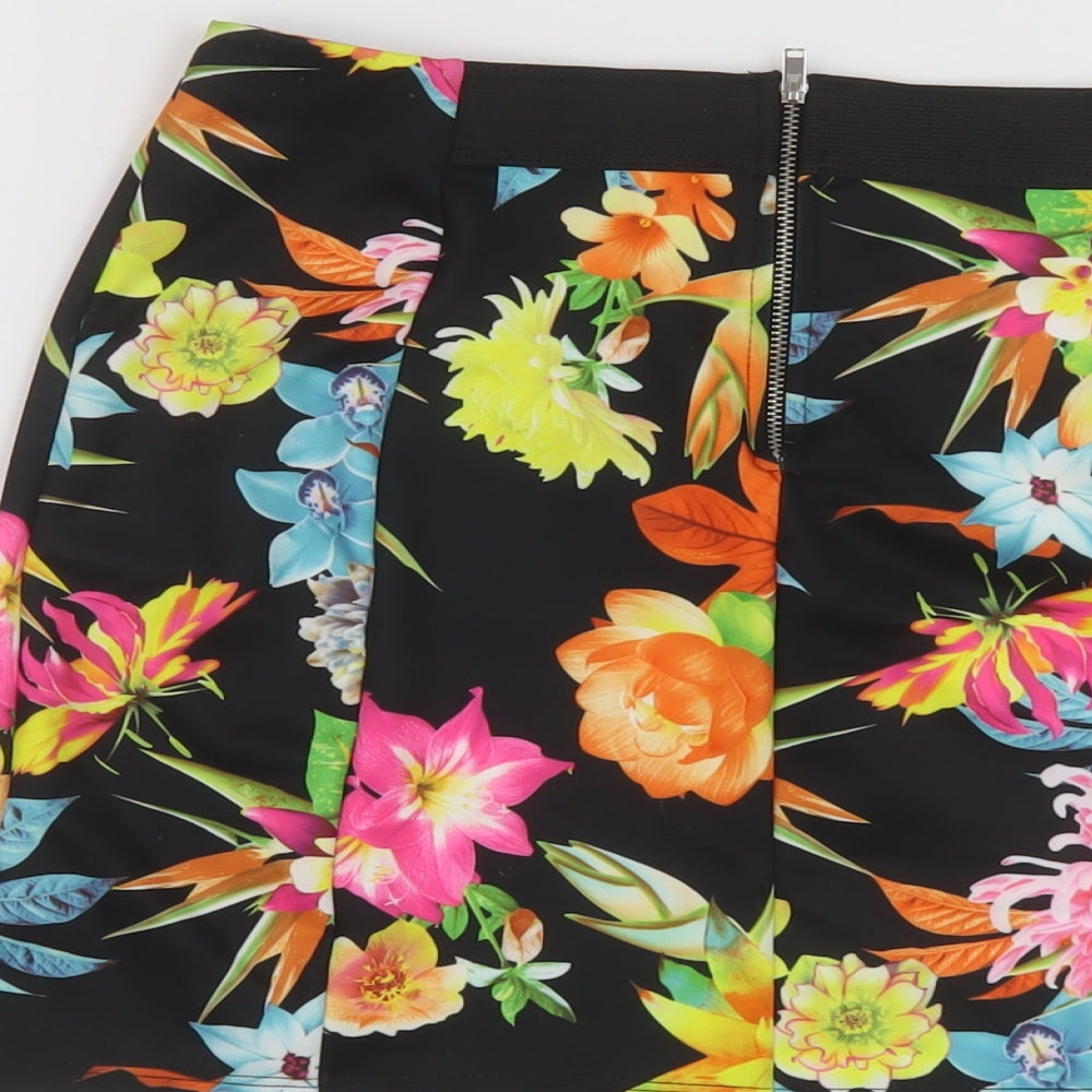 Brand and care label for Miss Selfridge women’s multicoloured floral polyester mini skirt, size UK 6, zip