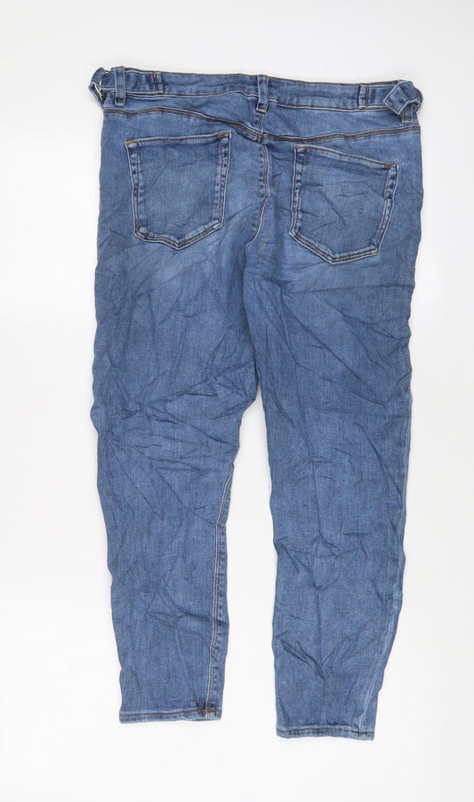 Back view of ASOS women’s blue cotton skinny jeans, size UK 32, in, 26-inch leg regular zip - buckle