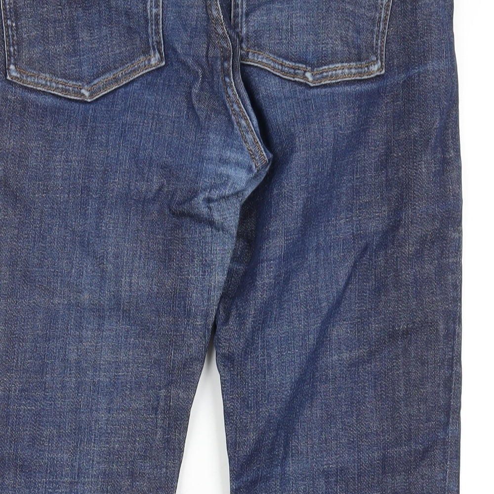 Brand and care label for COS men’s blue cotton skinny jeans, size 29, in, 30-inch leg regular zip