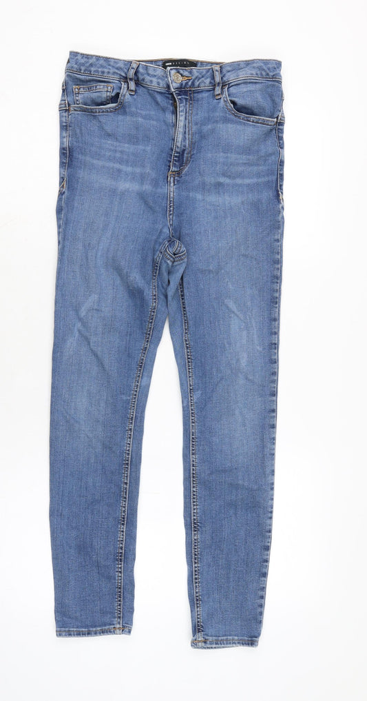Additional front view of ASOS women’s blue cotton blend tapered jeans, size UK 30, in, 27-inch leg regular zip