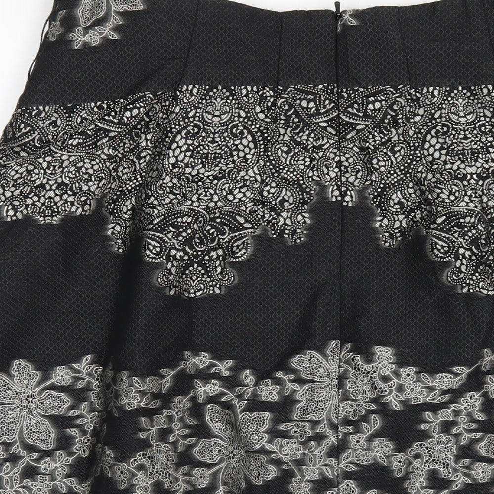Brand and care label for Kaliko women’s black geometric acetate a-line skirt, size UK 12, zip