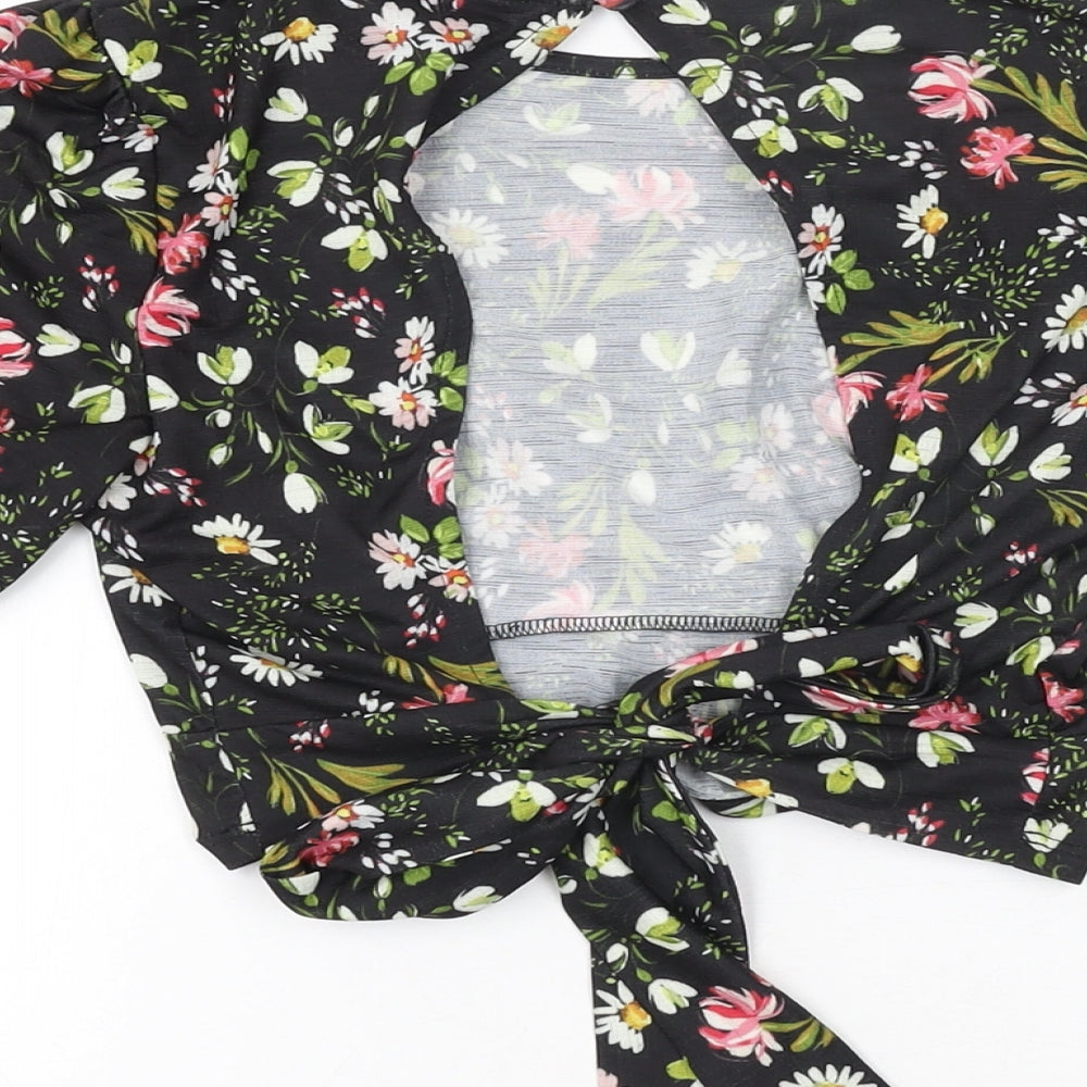 Brand and care label for Miss Selfridge women’s black floral polyester cropped t-shirt, size UK 6, round neck