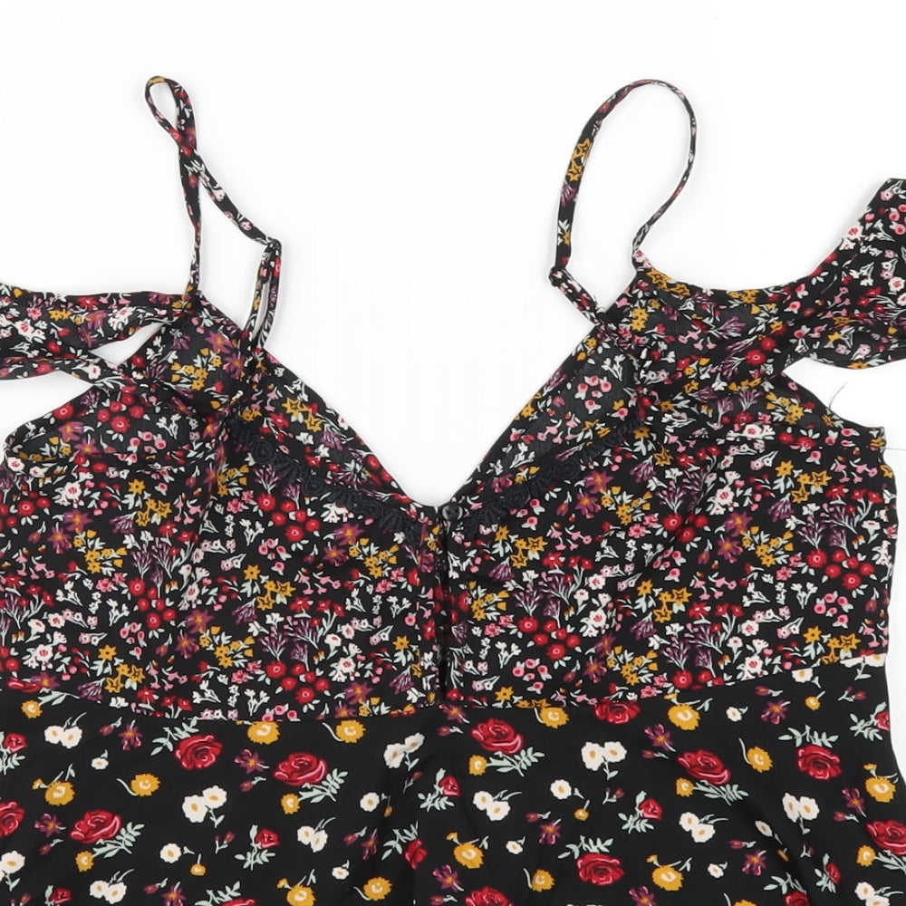 Brand and care label for Miss Selfridge women’s black floral polyester camisole t-shirt, size UK 8, v-neck