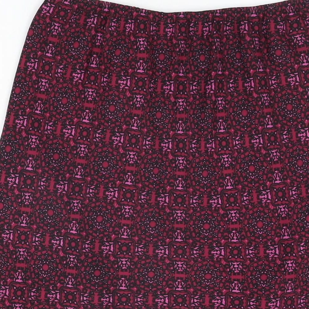 Brand and care label for AMARANTO women’s pink geometric polyester flare skirt, size UK 12