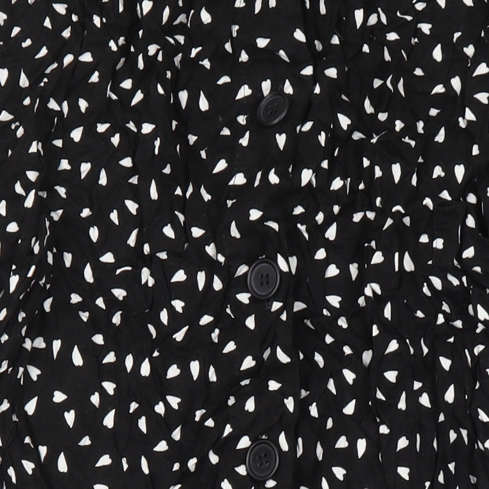 Brand and care label for ASOS women’s multicoloured geometric viscose a-line skirt, size UK 8