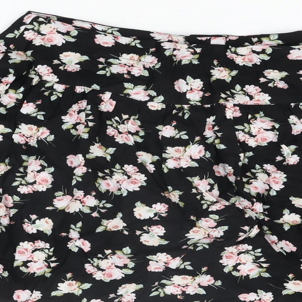 Brand and care label for ASOS women’s black floral viscose mini skirt, size UK 10, button