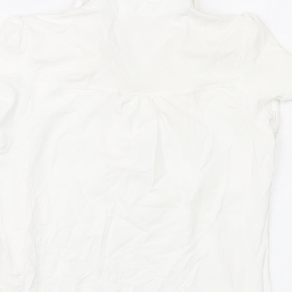 Brand and care label for Marks & Spencer girls’ ivory cotton basic t-shirt, size 11-12, years collared button