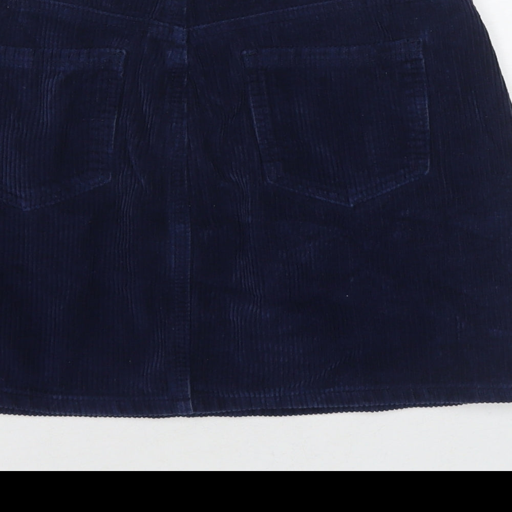 Brand and care label for Missguided women’s blue cotton a-line skirt, size UK 10, zip
