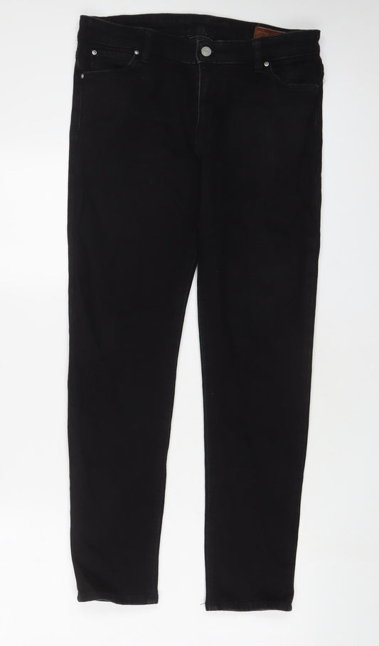 Additional front view of ASOS women’s black cotton skinny jeans, size UK 30, in, 30-inch leg regular zip