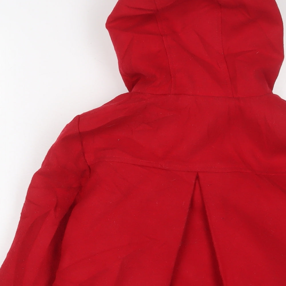 Brand and care label for Marks & Spencer girls’ red overcoat coat, size 7-8, years button