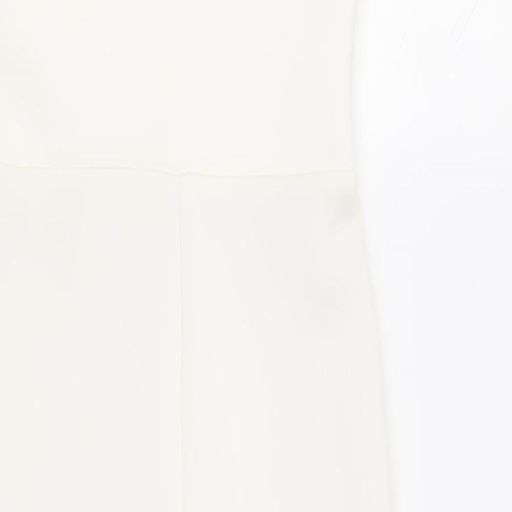 Brand and care label for ASOS women’s white polyester sheath, size UK 8, sweetheart pullover