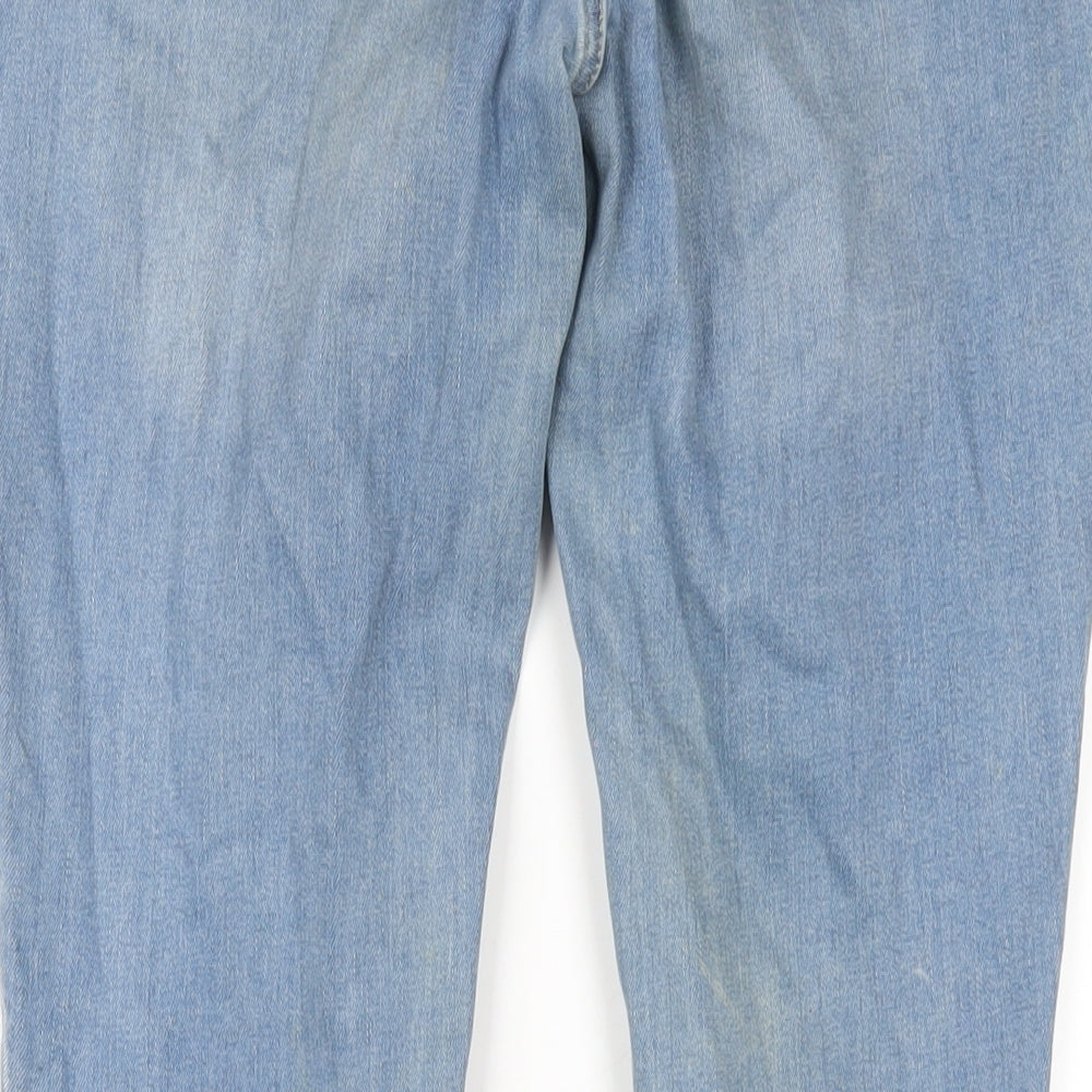 Brand and care label for ASOS women’s blue cotton skinny jeans, size UK 28, in, 32-inch leg regular zip