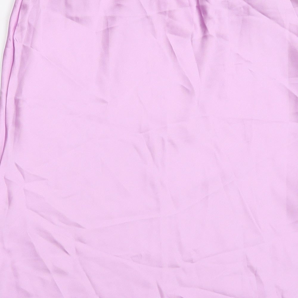 Brand and care label for Miss Selfridge women’s purple polyester a-line skirt, size UK 8