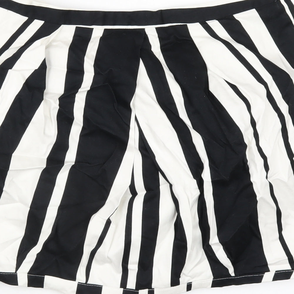 Brand and care label for ASOS women’s black striped cotton mini skirt, size UK 12, zip