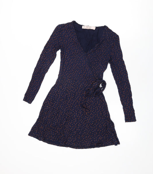 Additional front view of Miss Selfridge women’s blue polka dot viscose wrap dress, size UK 4, v-neck pullover