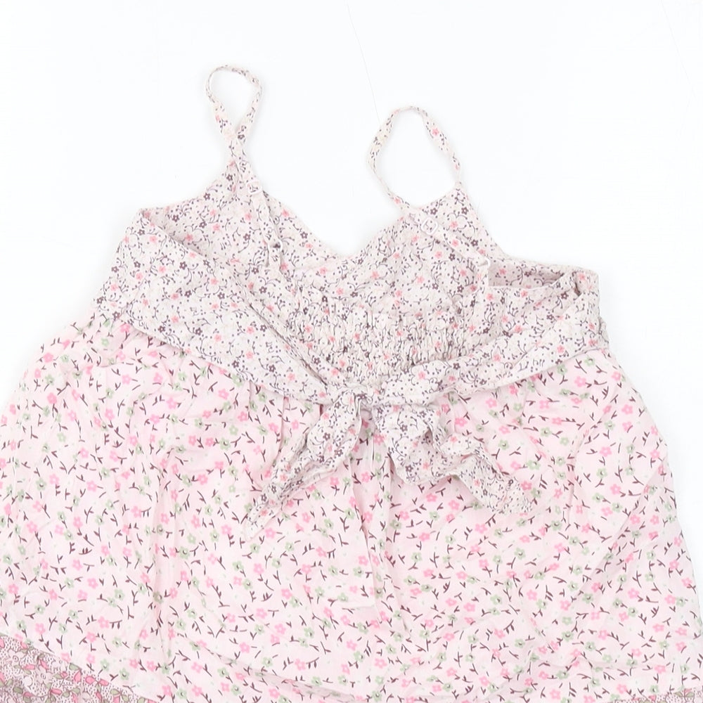Brand and care label for Gap girls’ pink floral cotton basic tank, size 6-7, years square neck pullover
