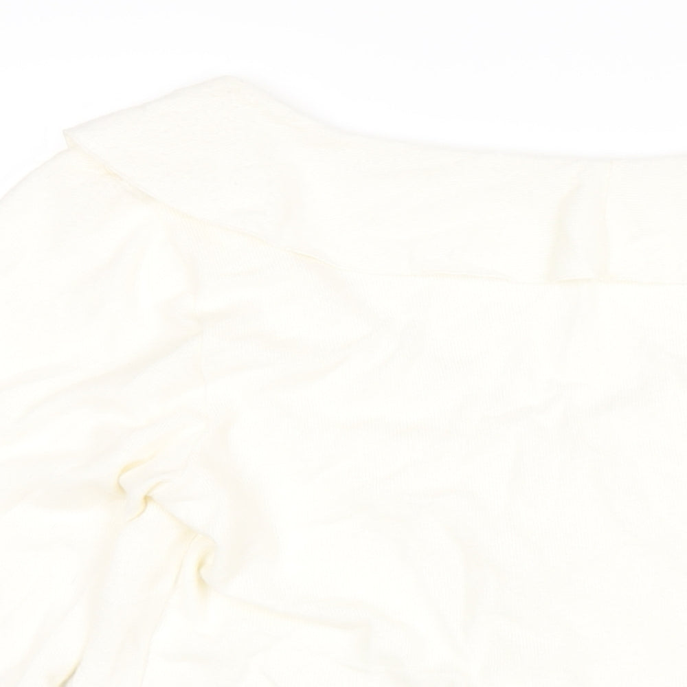 Brand and care label for Only Carmakoma women’s ivory v-neck acrylic jumper, size UK 18