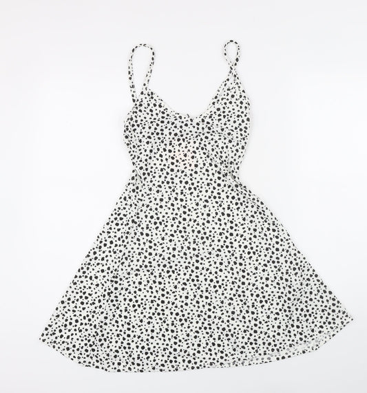 Additional front view of Missguided women’s white polka dot polyester a-line, size UK 8, v-neck