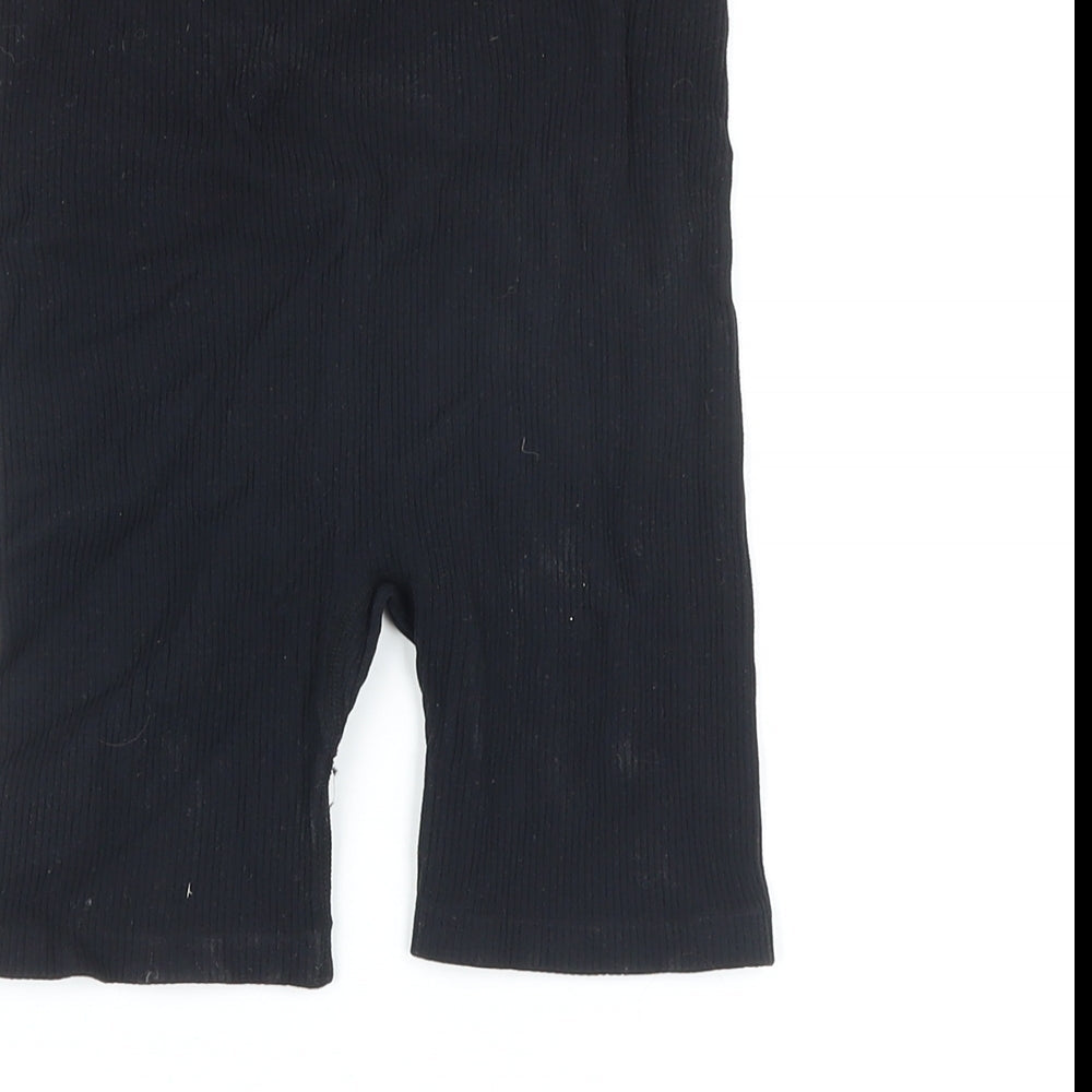 Brand and care label for Dunnes women’s black polyimide basic shorts, size XS, regular - elasticated waist