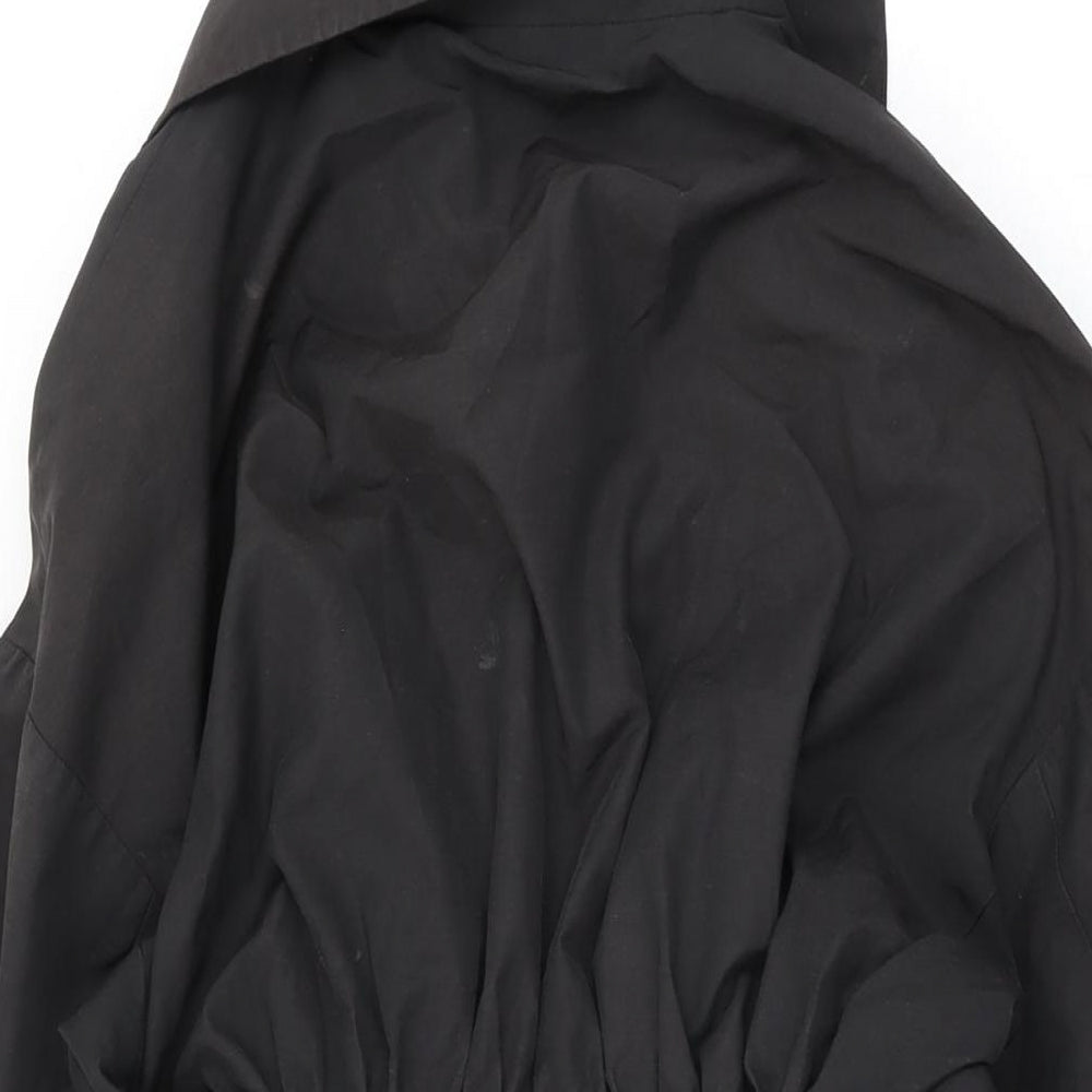 Brand and care label for Betty Jackson women’s black trench coat coat, size UK 12, button
