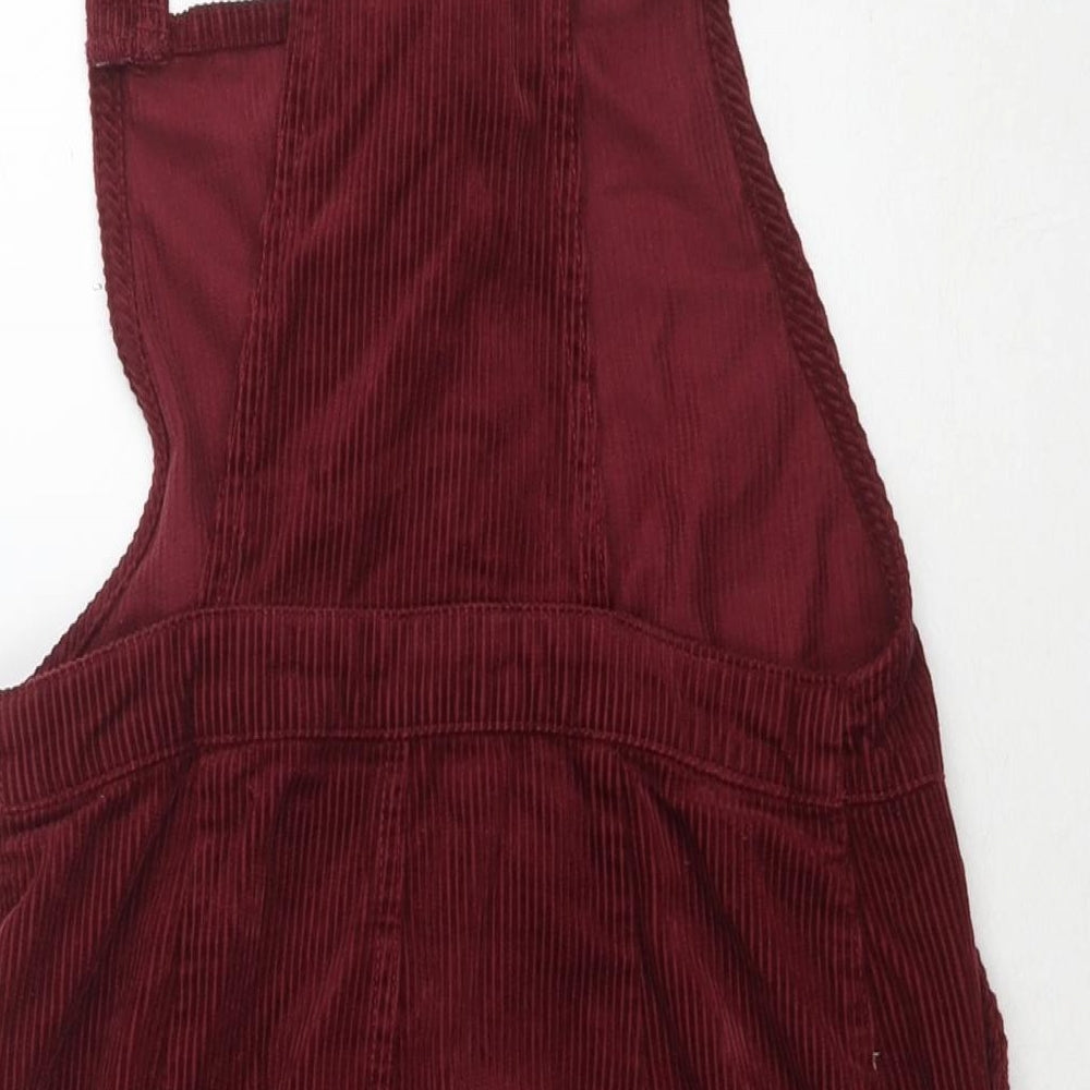 Brand and care label for Miss Selfridge women’s red cotton pinafore/dungaree dress, size UK 6, square neck button