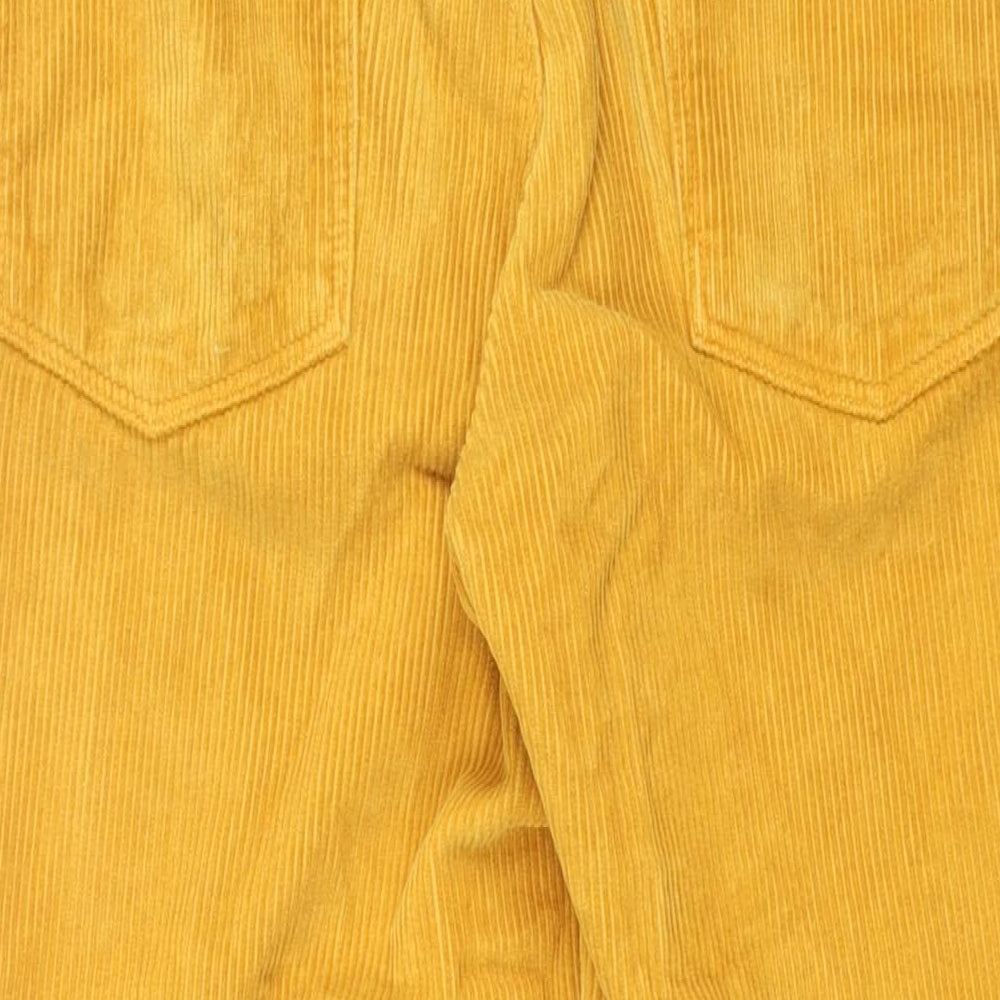 Brand and care label for ASOS women’s yellow cotton straight jeans, size UK 32, in, 32-inch leg regular zip - corduroy