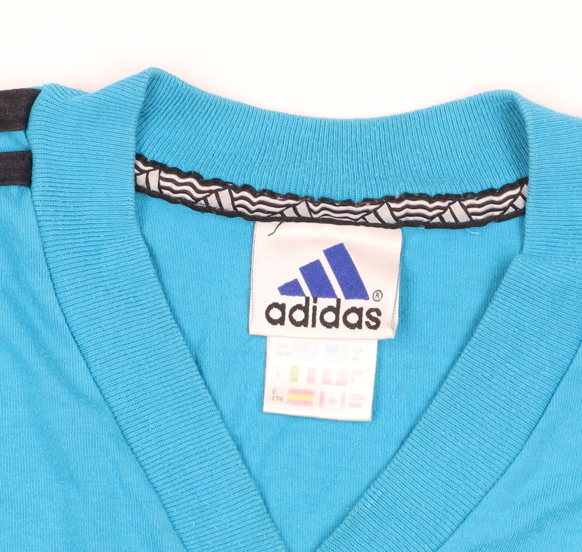 Brand and care label for Adidas Blue V-Neck T-Shirt, Medium, Cotton Comfort