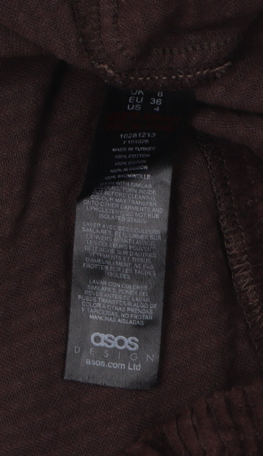 Close-up detail of Asos Women's Brown Corduroy Skirt, size 8