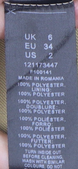 Brand and care label for ASOS DESIGN Women's Beige Dress Pants, size 6