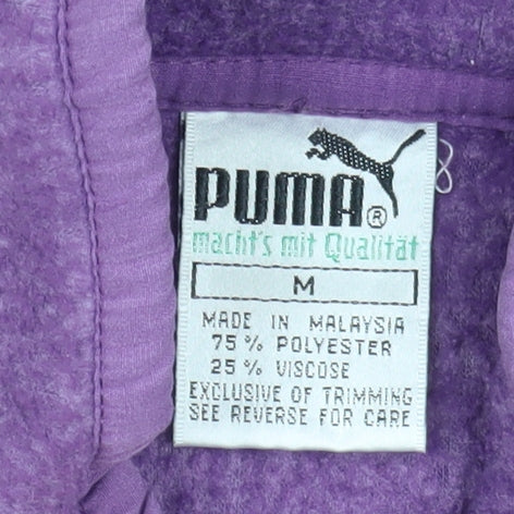 Close-up detail of Puma Women's Purple Fleece Jacket, size M, Casual Style