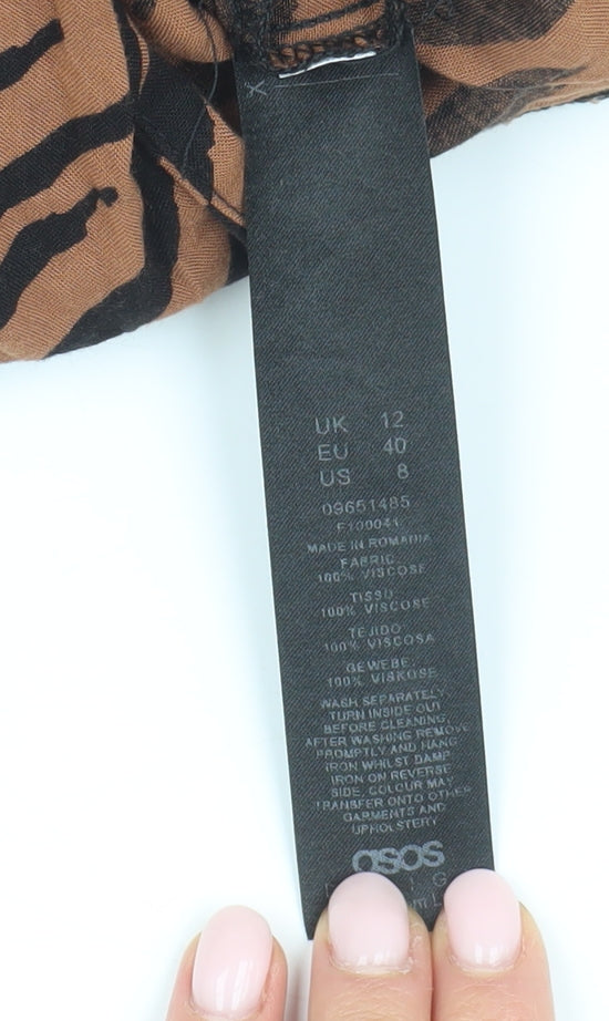 Brand and care label for ASOS Design Brown Animal Print Jumpsuit, size 12, Viscose