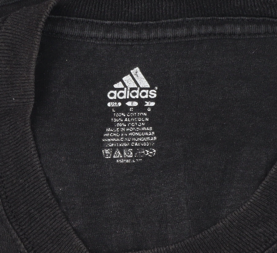 Close-up detail of Adidas Men's Black Heat Logo T-Shirt L Sports Style