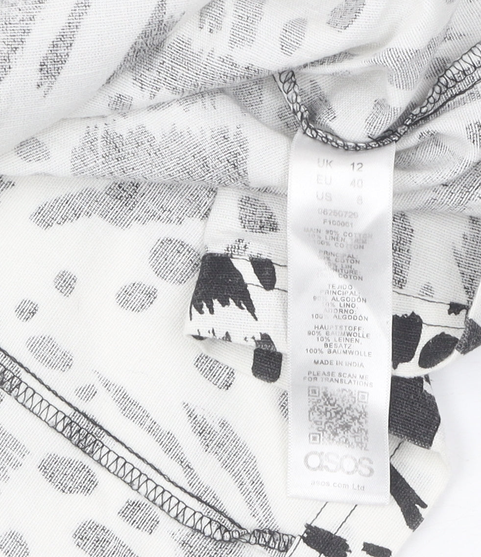 Brand and care label for ASOS Women's Black White Animal Print Pinafore Dress UK 12