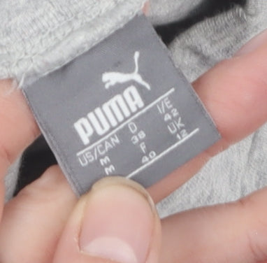 Close-up detail of Puma unisex grey jogger trousers, size 12