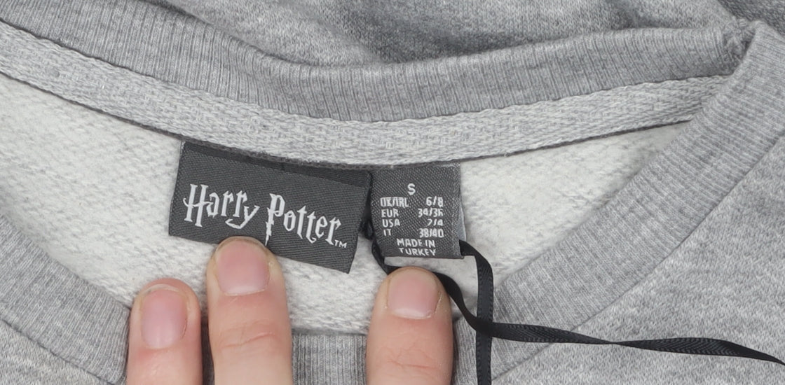 Brand and care label for Harry Potter Grey unisex pullover sweatshirt s