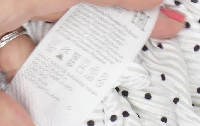 Brand and care label for Jacqueline de Yong Women's White Polka Dot Blouse