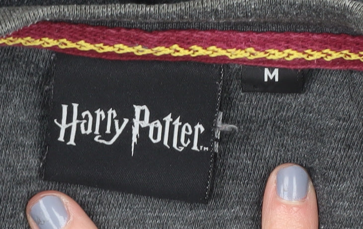 Brand and care label for Harry Potter unisex grey gryffindor sweatshirt m